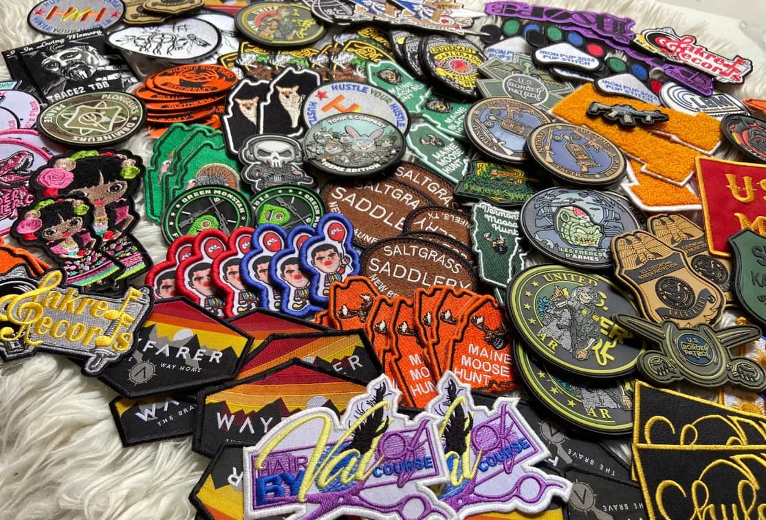 Assorted patch collection with custom lettering and badge shapes