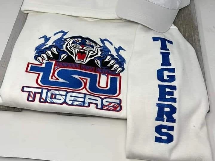 TSU Tigers embroidery on a matching white cap and garment